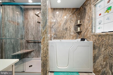 Welcome to this stunning single-level waterfront rancher in on Ocean Pines Golf and Country Club in Maryland - for sale on GolfHomes.com, golf home, golf lot