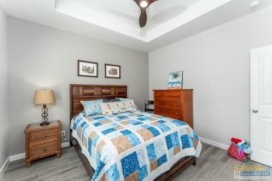 Welcome to coastal elegance in the heart of the SPI Golf on South Padre Island Golf Club in Texas - for sale on GolfHomes.com, golf home, golf lot