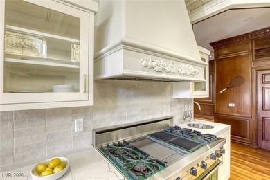 Inside exclusive gates of Canyon Gate, this elegant golf villa on Canyon Gate Country Club in Nevada - for sale on GolfHomes.com, golf home, golf lot