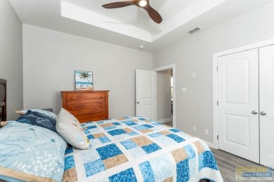 Welcome to coastal elegance in the heart of the SPI Golf on South Padre Island Golf Club in Texas - for sale on GolfHomes.com, golf home, golf lot