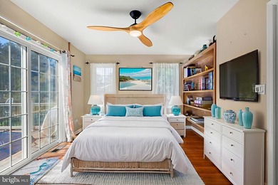 Welcome to this stunning single-level waterfront rancher in on Ocean Pines Golf and Country Club in Maryland - for sale on GolfHomes.com, golf home, golf lot