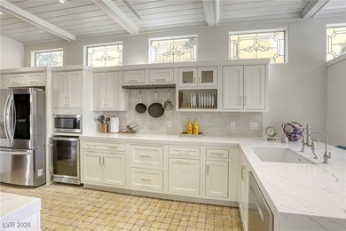 Inside exclusive gates of Canyon Gate, this elegant golf villa on Canyon Gate Country Club in Nevada - for sale on GolfHomes.com, golf home, golf lot