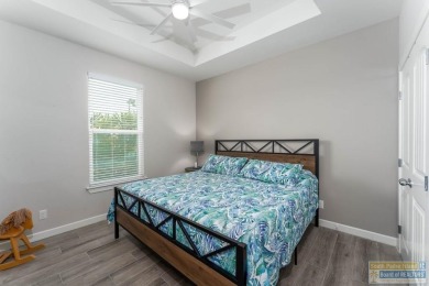 Welcome to coastal elegance in the heart of the SPI Golf on South Padre Island Golf Club in Texas - for sale on GolfHomes.com, golf home, golf lot