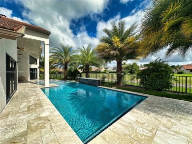 Amazing home FOR SALE located in the prestigious community of on Woodmont Country Club in Florida - for sale on GolfHomes.com, golf home, golf lot