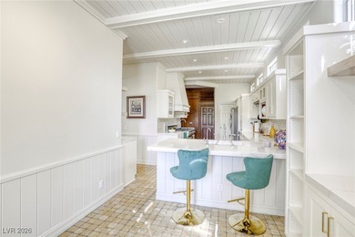 Inside exclusive gates of Canyon Gate, this elegant golf villa on Canyon Gate Country Club in Nevada - for sale on GolfHomes.com, golf home, golf lot