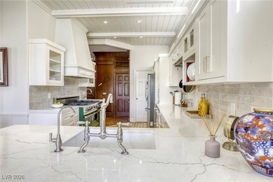 Inside exclusive gates of Canyon Gate, this elegant golf villa on Canyon Gate Country Club in Nevada - for sale on GolfHomes.com, golf home, golf lot