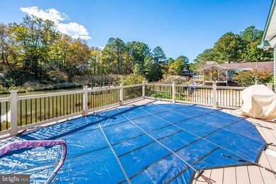 Welcome to this stunning single-level waterfront rancher in on Ocean Pines Golf and Country Club in Maryland - for sale on GolfHomes.com, golf home, golf lot