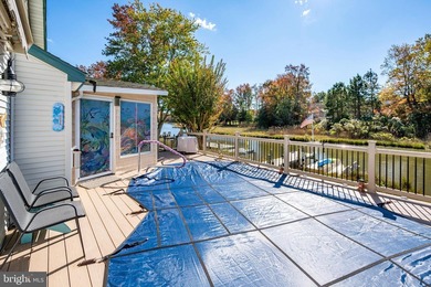 Welcome to this stunning single-level waterfront rancher in on Ocean Pines Golf and Country Club in Maryland - for sale on GolfHomes.com, golf home, golf lot