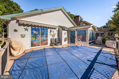 Welcome to this stunning single-level waterfront rancher in on Ocean Pines Golf and Country Club in Maryland - for sale on GolfHomes.com, golf home, golf lot