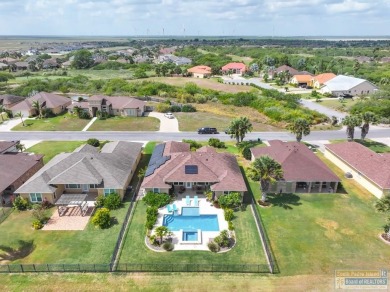 Welcome to coastal elegance in the heart of the SPI Golf on South Padre Island Golf Club in Texas - for sale on GolfHomes.com, golf home, golf lot