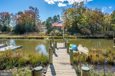 Welcome to this stunning single-level waterfront rancher in on Ocean Pines Golf and Country Club in Maryland - for sale on GolfHomes.com, golf home, golf lot