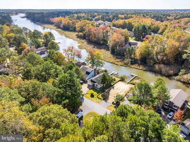 Welcome to this stunning single-level waterfront rancher in on Ocean Pines Golf and Country Club in Maryland - for sale on GolfHomes.com, golf home, golf lot