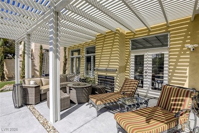 Inside exclusive gates of Canyon Gate, this elegant golf villa on Canyon Gate Country Club in Nevada - for sale on GolfHomes.com, golf home, golf lot