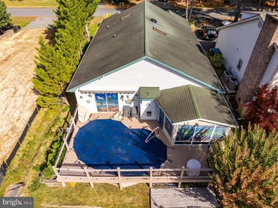 Welcome to this stunning single-level waterfront rancher in on Ocean Pines Golf and Country Club in Maryland - for sale on GolfHomes.com, golf home, golf lot