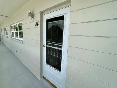 Beyond the threshold of this well-kept 2 bedroom, 2 bathroom on On Top Of The World Golf Course in Florida - for sale on GolfHomes.com, golf home, golf lot