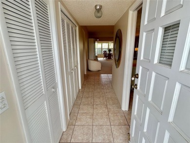 Beyond the threshold of this well-kept 2 bedroom, 2 bathroom on On Top Of The World Golf Course in Florida - for sale on GolfHomes.com, golf home, golf lot