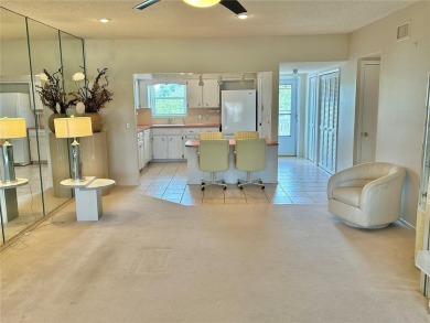 Beyond the threshold of this well-kept 2 bedroom, 2 bathroom on On Top Of The World Golf Course in Florida - for sale on GolfHomes.com, golf home, golf lot