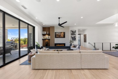 Entering through the striking metal-glass front door into a on The Ledges Golf Club in Utah - for sale on GolfHomes.com, golf home, golf lot