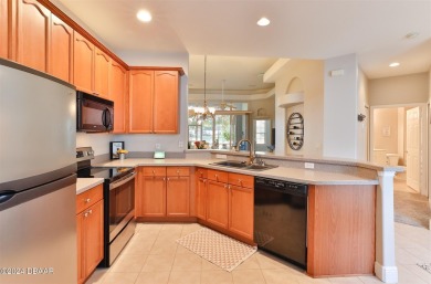 Lakefront paradise! This impeccably maintained 2-bed, 2-bath on LPGA International Golf Course in Florida - for sale on GolfHomes.com, golf home, golf lot