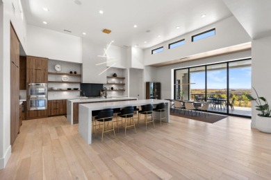 Entering through the striking metal-glass front door into a on The Ledges Golf Club in Utah - for sale on GolfHomes.com, golf home, golf lot