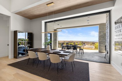 Entering through the striking metal-glass front door into a on The Ledges Golf Club in Utah - for sale on GolfHomes.com, golf home, golf lot