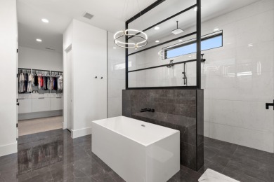 Entering through the striking metal-glass front door into a on The Ledges Golf Club in Utah - for sale on GolfHomes.com, golf home, golf lot