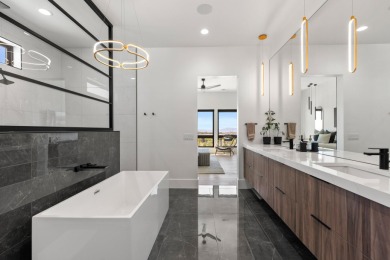 Entering through the striking metal-glass front door into a on The Ledges Golf Club in Utah - for sale on GolfHomes.com, golf home, golf lot