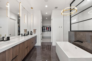 Entering through the striking metal-glass front door into a on The Ledges Golf Club in Utah - for sale on GolfHomes.com, golf home, golf lot