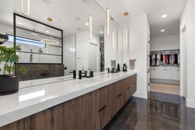 Entering through the striking metal-glass front door into a on The Ledges Golf Club in Utah - for sale on GolfHomes.com, golf home, golf lot