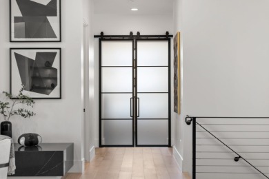 Entering through the striking metal-glass front door into a on The Ledges Golf Club in Utah - for sale on GolfHomes.com, golf home, golf lot