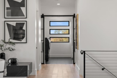 Entering through the striking metal-glass front door into a on The Ledges Golf Club in Utah - for sale on GolfHomes.com, golf home, golf lot