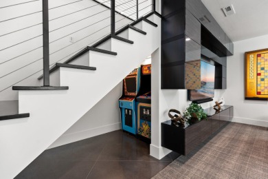 Entering through the striking metal-glass front door into a on The Ledges Golf Club in Utah - for sale on GolfHomes.com, golf home, golf lot