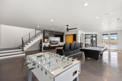 Entering through the striking metal-glass front door into a on The Ledges Golf Club in Utah - for sale on GolfHomes.com, golf home, golf lot