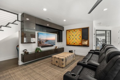 Entering through the striking metal-glass front door into a on The Ledges Golf Club in Utah - for sale on GolfHomes.com, golf home, golf lot
