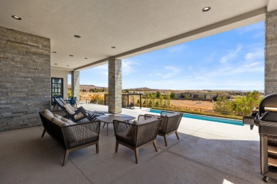 Entering through the striking metal-glass front door into a on The Ledges Golf Club in Utah - for sale on GolfHomes.com, golf home, golf lot