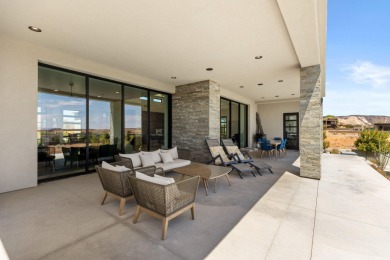 Entering through the striking metal-glass front door into a on The Ledges Golf Club in Utah - for sale on GolfHomes.com, golf home, golf lot