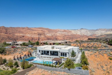 Entering through the striking metal-glass front door into a on The Ledges Golf Club in Utah - for sale on GolfHomes.com, golf home, golf lot
