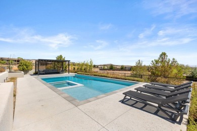 Entering through the striking metal-glass front door into a on The Ledges Golf Club in Utah - for sale on GolfHomes.com, golf home, golf lot