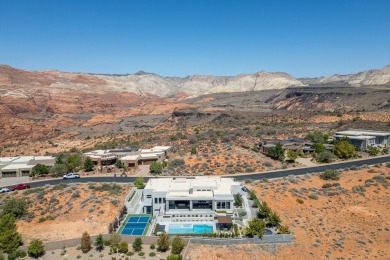Entering through the striking metal-glass front door into a on The Ledges Golf Club in Utah - for sale on GolfHomes.com, golf home, golf lot