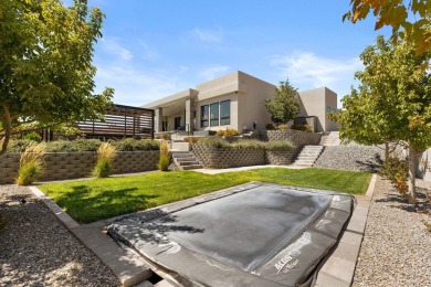 Entering through the striking metal-glass front door into a on The Ledges Golf Club in Utah - for sale on GolfHomes.com, golf home, golf lot