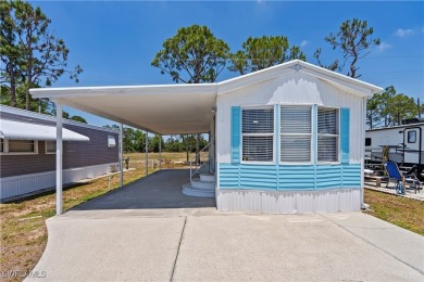 Welcome to this cozy and efficient 1-bedroom manufactured home on Del Tura Golf and Country Club in Florida - for sale on GolfHomes.com, golf home, golf lot