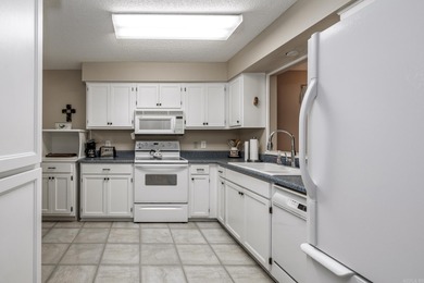 This beautifully maintained end unit is move in ready! From the on Cortez Golf Course in Arkansas - for sale on GolfHomes.com, golf home, golf lot