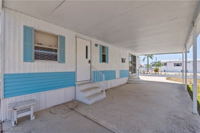 Welcome to this cozy and efficient 1-bedroom manufactured home on Del Tura Golf and Country Club in Florida - for sale on GolfHomes.com, golf home, golf lot