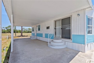 Welcome to this cozy and efficient 1-bedroom manufactured home on Del Tura Golf and Country Club in Florida - for sale on GolfHomes.com, golf home, golf lot