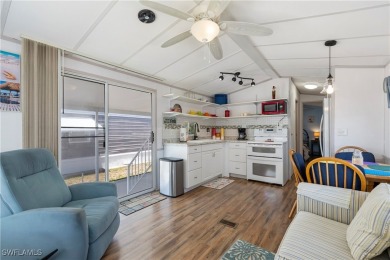 Welcome to this cozy and efficient 1-bedroom manufactured home on Del Tura Golf and Country Club in Florida - for sale on GolfHomes.com, golf home, golf lot