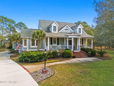 Nestled on over 1 1/2 acres in a beautiful maritime forest on Lockwood Folly Country Club in North Carolina - for sale on GolfHomes.com, golf home, golf lot