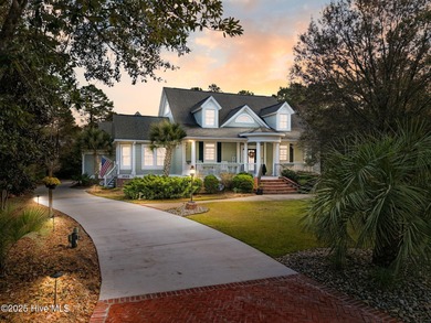 Nestled on over 1 1/2 acres in a beautiful maritime forest on Lockwood Folly Country Club in North Carolina - for sale on GolfHomes.com, golf home, golf lot
