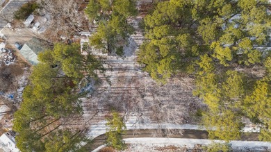 JUST BRING YOUR CAMPER!! Beautifully Level Double Lot Available on River Golf and Country Club at Lake Royale in North Carolina - for sale on GolfHomes.com, golf home, golf lot