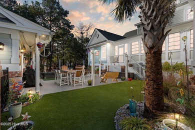 Nestled on over 1 1/2 acres in a beautiful maritime forest on Lockwood Folly Country Club in North Carolina - for sale on GolfHomes.com, golf home, golf lot