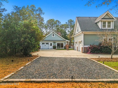 Nestled on over 1 1/2 acres in a beautiful maritime forest on Lockwood Folly Country Club in North Carolina - for sale on GolfHomes.com, golf home, golf lot